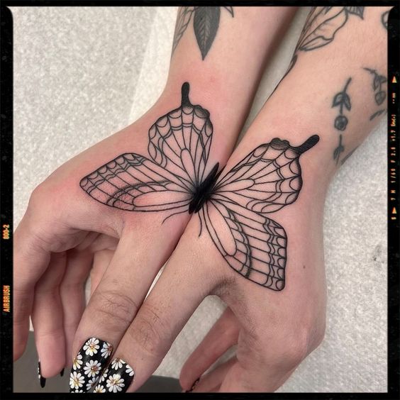 Hand Butterfly Tattoo