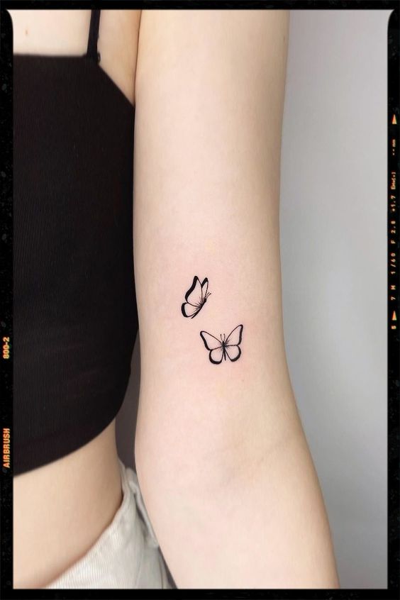 Minimal Butterfly Tattoo