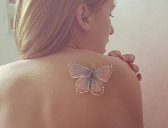 White Ink Butterfly Tattoo