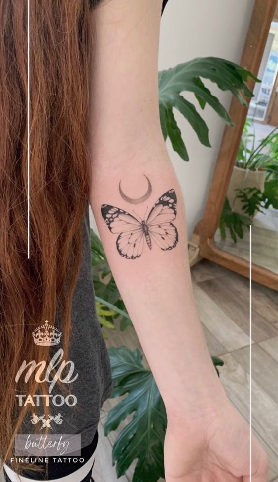 Womanhood Butterfly Tattoo