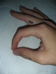 Finger 999 Tattoo